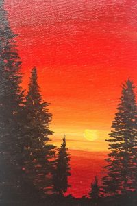 Serene Sunset with pine trees